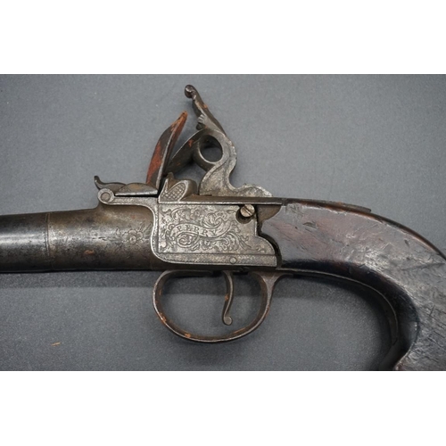 1740 - An antique flintlock pocket pistol, by 'Perry, London', with walnut grip, overall length 19.5cm.... 