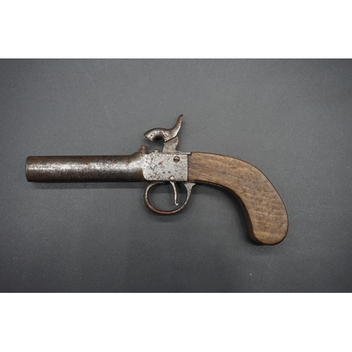 1743 - A 19th century percussion pocket pistol, having 7cm screw off barrel, unsigned, overall length 18cm.... 