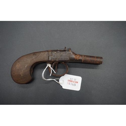 1745 - An antique double barrel percussion pistol, by 'Parkinson', overall length 24cm; together with anoth... 