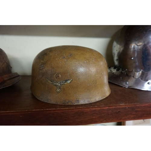 1811 - A German World War II Luftwaffe paratrooper's Fallschirmjager helmet.PLEASE NOTE: WE NOW BELIEVE THI... 