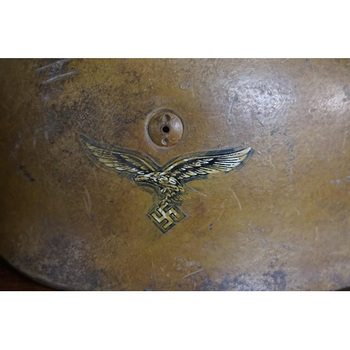 1811 - A German World War II Luftwaffe paratrooper's Fallschirmjager helmet.PLEASE NOTE: WE NOW BELIEVE THI... 