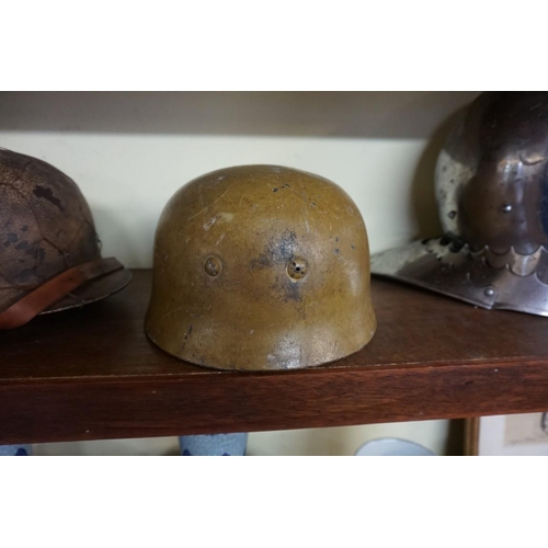 1811 - A German World War II Luftwaffe paratrooper's Fallschirmjager helmet.PLEASE NOTE: WE NOW BELIEVE THI... 