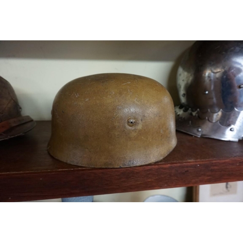 1811 - A German World War II Luftwaffe paratrooper's Fallschirmjager helmet.PLEASE NOTE: WE NOW BELIEVE THI... 