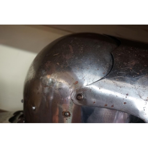 1812 - A reproduction mediaeval knight's steel jousting helmet, having armourers stamp to tail.... 