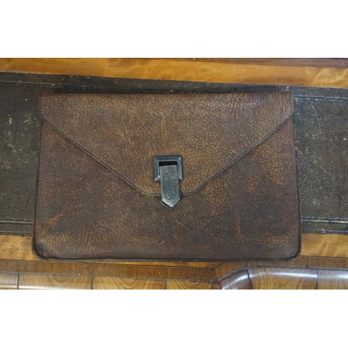 1315 - WITHDRAWN FROM SALE: A vintage Hermes small leather bag or purse, with monogrammed metal clasp 23cm ... 