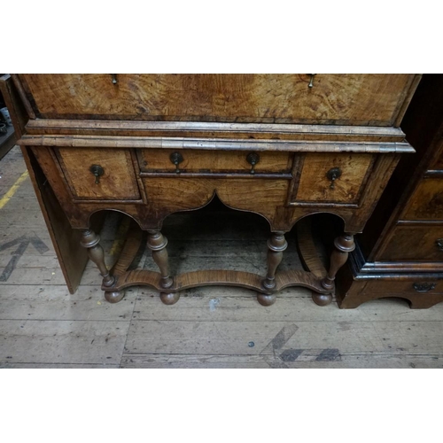 1347 - A George I elm and burr elm crossbanded chest on stand, 95cm wide.