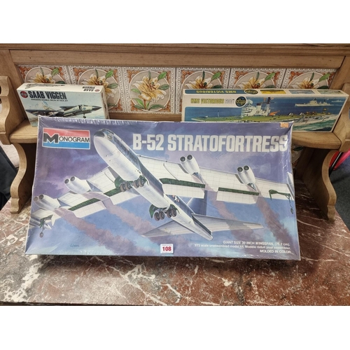 108 - Monogram: a B-52 Stratofortress unassembled model kit, 1/72 scale in sealed box; together with two A... 