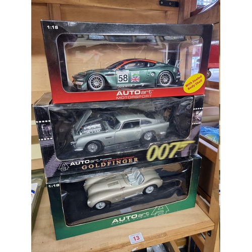 13 - Autoart: The James Bond Collection, Goldfinger DB5; together with an Aston Martin DBR9 LeMans; and a... 