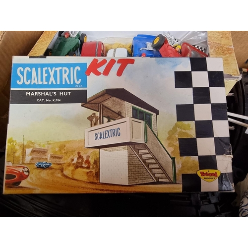 24 - Scalextric: a vintage Scalextric set, comprising: seven cars, to include Javelin C4-10; Mini Cooper ... 