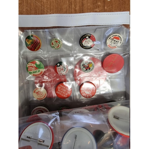 25 - Pin Badges: a small group of Christmas and New Year celebration pin badges, to include vintage examp... 