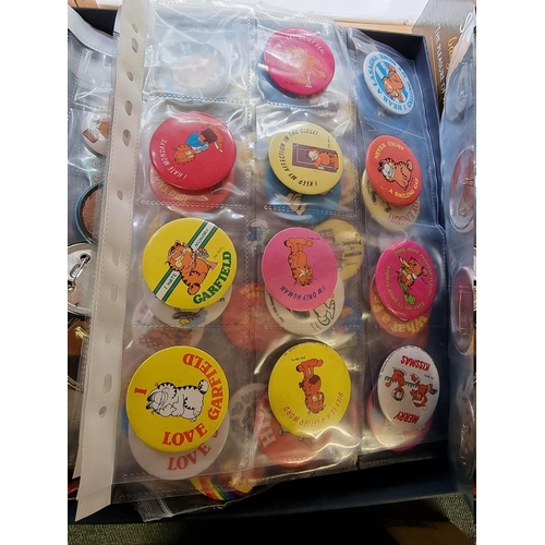 29 - Pin Badges: a large collection of various pin badges, some vintage, relating to television, film and... 