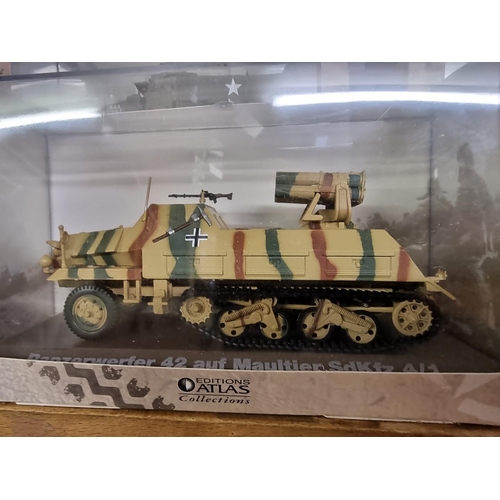 33 - Atlas Editions: a collection of nineteen boxed military vehicles.