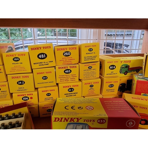 44 - Dinky: a collection of 50 boxed re-issues by Norev/Atlas.