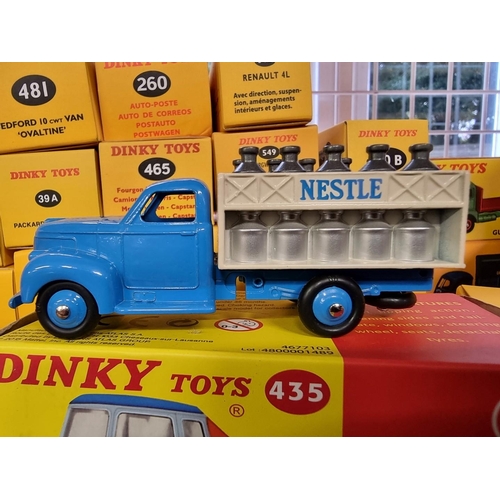 44 - Dinky: a collection of 50 boxed re-issues by Norev/Atlas.