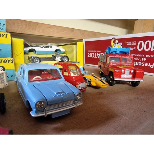 55 - Vintage Diecast: a group of seven vehicles to include a Dinky 162 Triumph 1300; Corgi Toys Nos: 271;... 