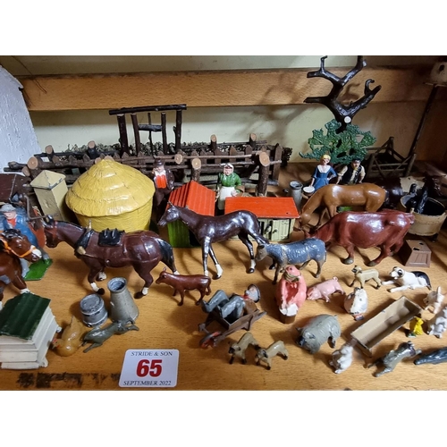 65 - Vintage Lead: a collection of Britains and similar lead farmyard figures and animals, to includ... 