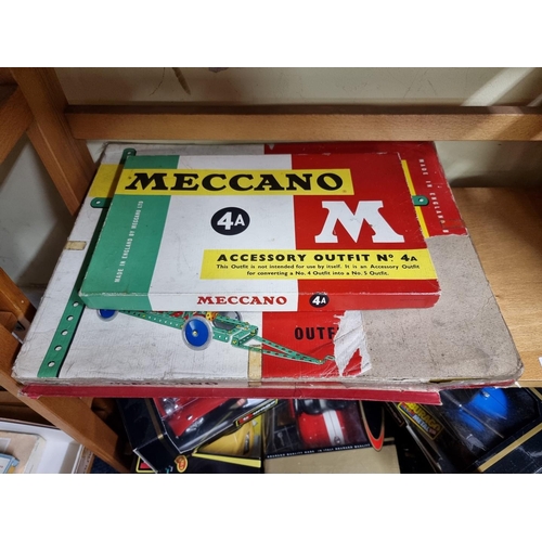 66 - Meccano: two vintage boxed sets, Outfits Nos. 4 & 4a, together with instruction booklet.... 