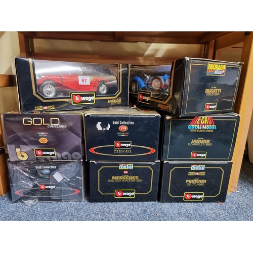 67 - Burago: eight diecast boxed models, to include three from the Gold Collection.