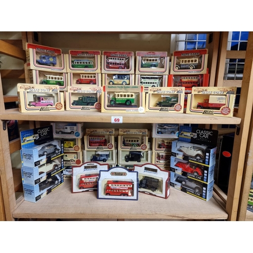 69 - Corgi: six boxed diecast models in the 'Classics' series; together with thirty-seven boxed Lledo 'Da... 