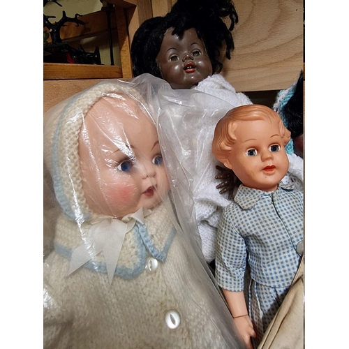 70 - Dolls: a group of eight vintage dolls, to include examples by Palitoy; Kader and Roddy.... 