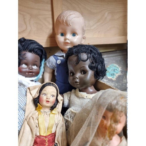 70 - Dolls: a group of eight vintage dolls, to include examples by Palitoy; Kader and Roddy.... 