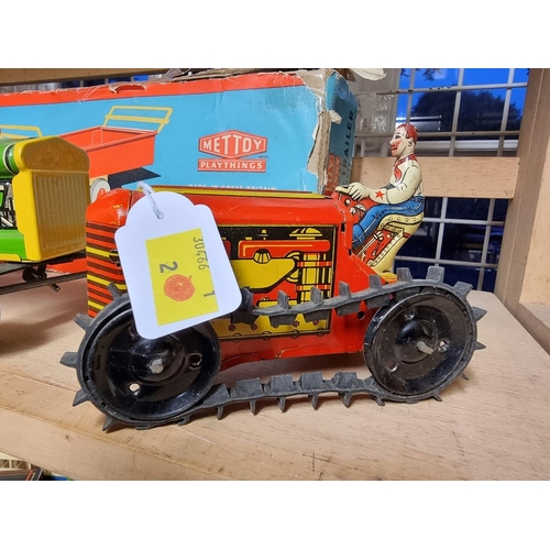 75 - A vintage MAR tinplate tractor; together with a boxed Mettoy tinplate tractor and trailer.... 