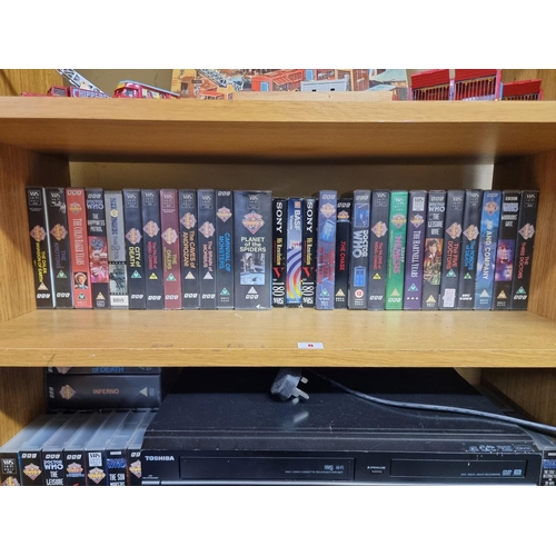 8 - Doctor Who: a collection of approximately 85 VHS videos, some in presentation boxes and tins; t... 