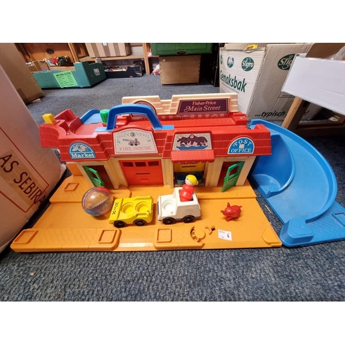 96 - Fisher-Price: a 'Main Street' playset, (complete); together with a large quantity of Playmobile figu... 