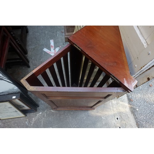 1045a - An antique mahogany corner laundry basket. 