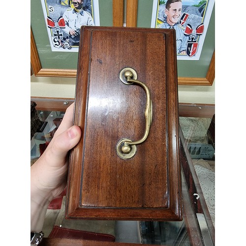 1310 - An early George III mahogany tea caddy, 25.5cm wide. 