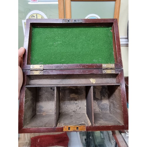 1310 - An early George III mahogany tea caddy, 25.5cm wide. 