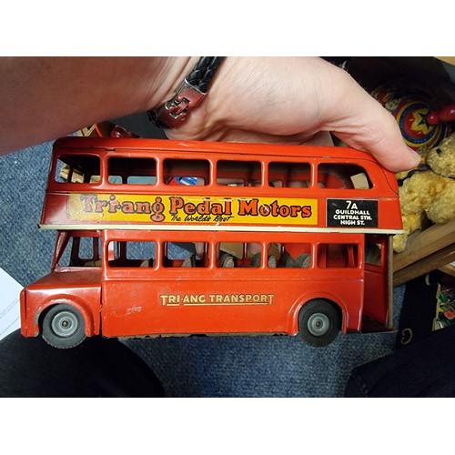 86 - Triang: a Minic red tinplate double decker bus; together with a group of vintage remote control cars... 