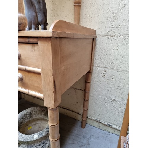 1119 - A Victorian pine and simulated bamboo kneehole dressing table, 94cm wide.