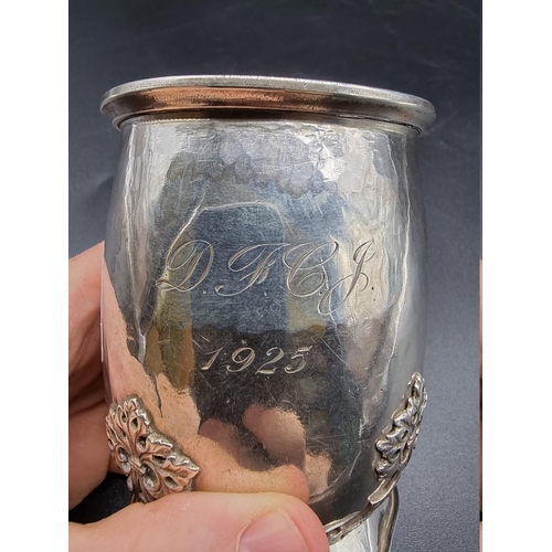 525 - An Arts & Crafts silver Christening mug, by Amy Sandheim, London 1925, 9cm high, 206g.... 