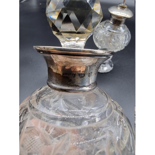 537 - A white metal mounted cut glass atomiser and matching scent bottle, by HH & SN, stamped 'St... 