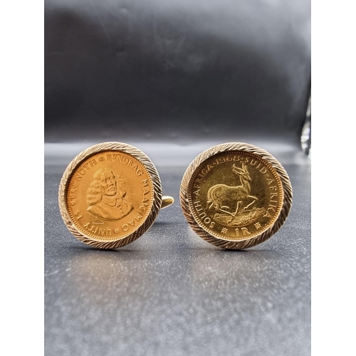 680 - A pair of 9ct gold cufflinks, each set South Africa one rand gold coin, dated 1968/71, gross weight ... 