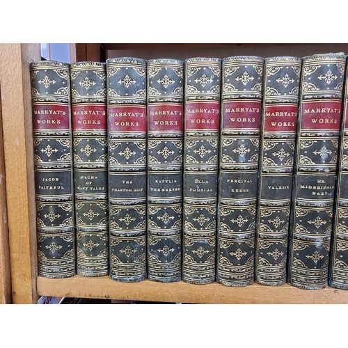 102 - BINDINGS: MARRYAT (Captain): collection of 16 works by Marryat, pub. Routledge c.1873, uniform ... 