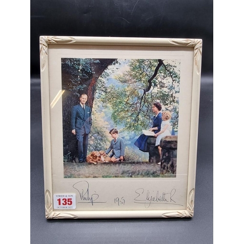 135 - ROYAL INTEREST:  HRH Queen Elizabeth II and Prince Philip: colour photograph posed in woodland scene... 