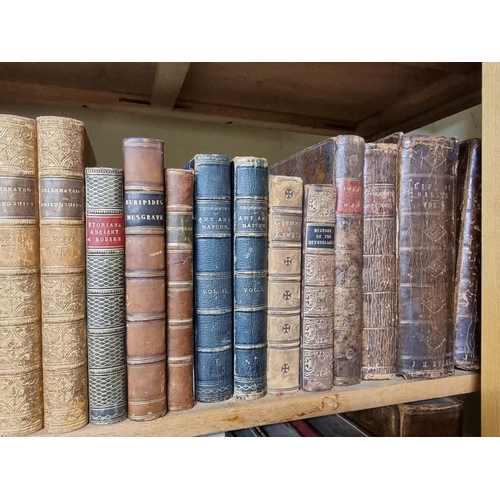 145 - BINDINGS: a quantity of leather bound books over 3 shelves. 