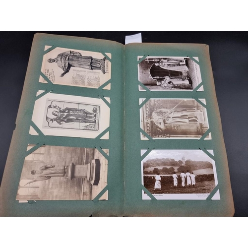 149 - POSTCARD ALBUM: a large format early c20 album, pages full with misc. topographical, comic, historic... 