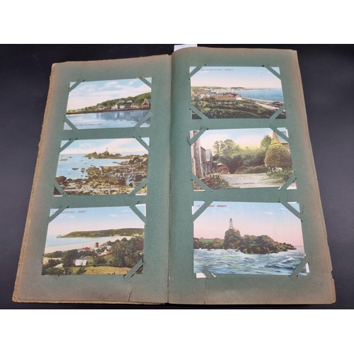 149 - POSTCARD ALBUM: a large format early c20 album, pages full with misc. topographical, comic, historic... 