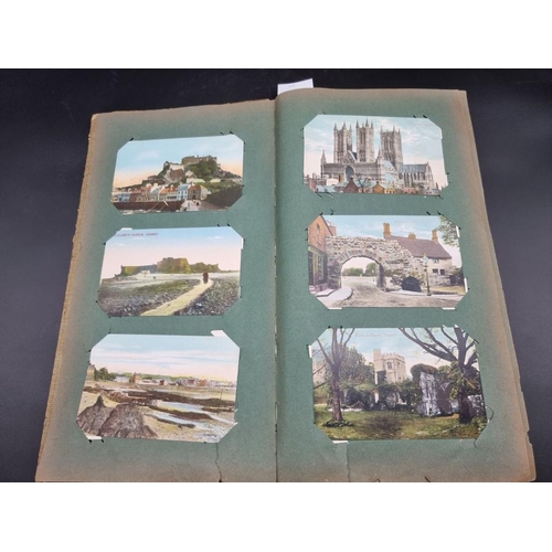 149 - POSTCARD ALBUM: a large format early c20 album, pages full with misc. topographical, comic, historic... 