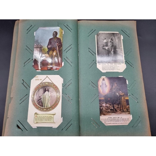 149 - POSTCARD ALBUM: a large format early c20 album, pages full with misc. topographical, comic, historic... 