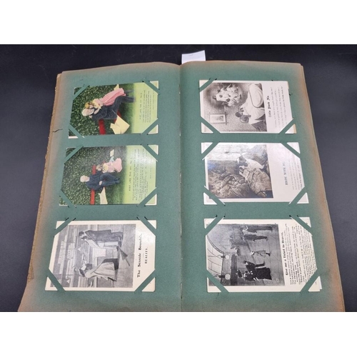 149 - POSTCARD ALBUM: a large format early c20 album, pages full with misc. topographical, comic, historic... 