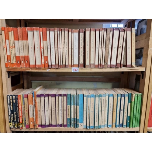 157 - PENGUIN PAPERBACKS: a collection of 74 vintage Penguin paperbacks over 2 shelves, plus 5 others... 