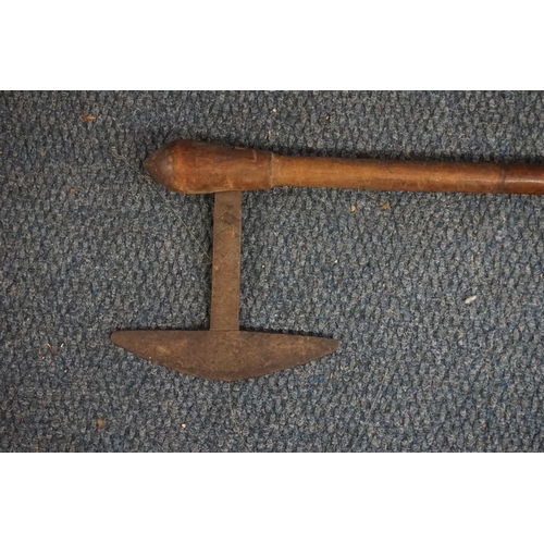 1803 - A South African Zulu or Swazi war axe, having decorated steel head, with partially decorated wooden ... 