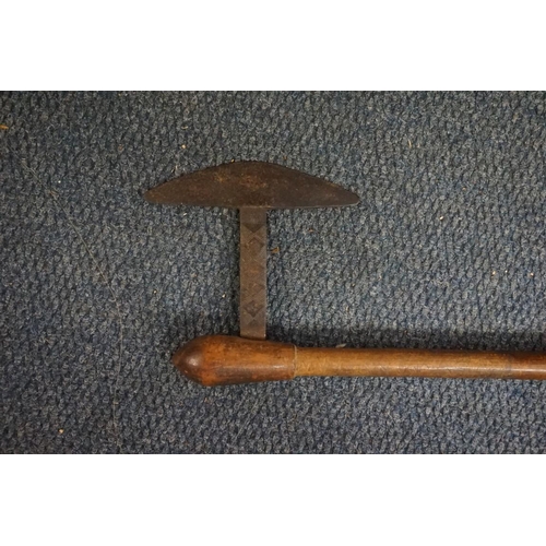 1803 - A South African Zulu or Swazi war axe, having decorated steel head, with partially decorated wooden ... 