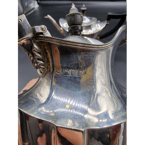 501 - An Edwardian silver teapot and matching hot water jug, by Thomas Bradbury & Sons, London 1905/6,... 