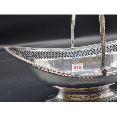 518 - A George III pierced silver swing handled oval basket, by William Allen III, London 1805, 940g, 37cm... 