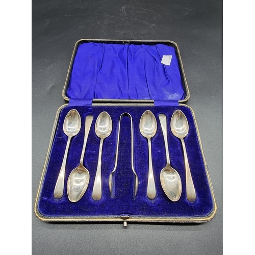 548 - A cased set of six silver Old English pattern teaspoons and sugar tongs, by John Round & So... 